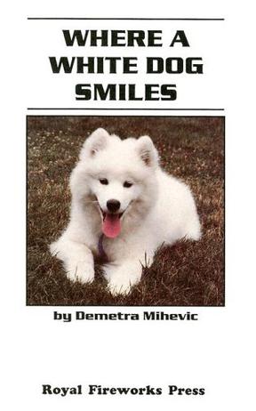 where a white dog smiles