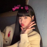 七七